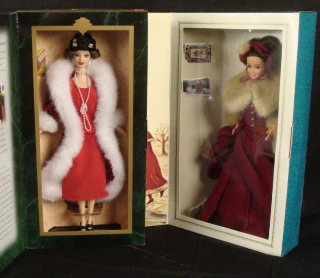 2 Barbies: Victorian Elegance, Holiday Voyage MIB: These are two special edition Barbie dolls. One is the First Edition in a series from Hallmark Cards, called Victorian Elegance. She wears a 19th century skating costume, and comes with two pe
