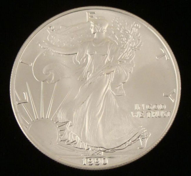 1990 American 1 Oz Silver Eagle Dollar $1 Coin Gem UNC: 1990 American 1 Oz Silver Eagle Dollar Content: .999 Fine Silver Diameter: 40.6 mm Grade: Gem Uncirculated For International shipping please request a SHIPPING QUOTE Shipping and handling for this ite