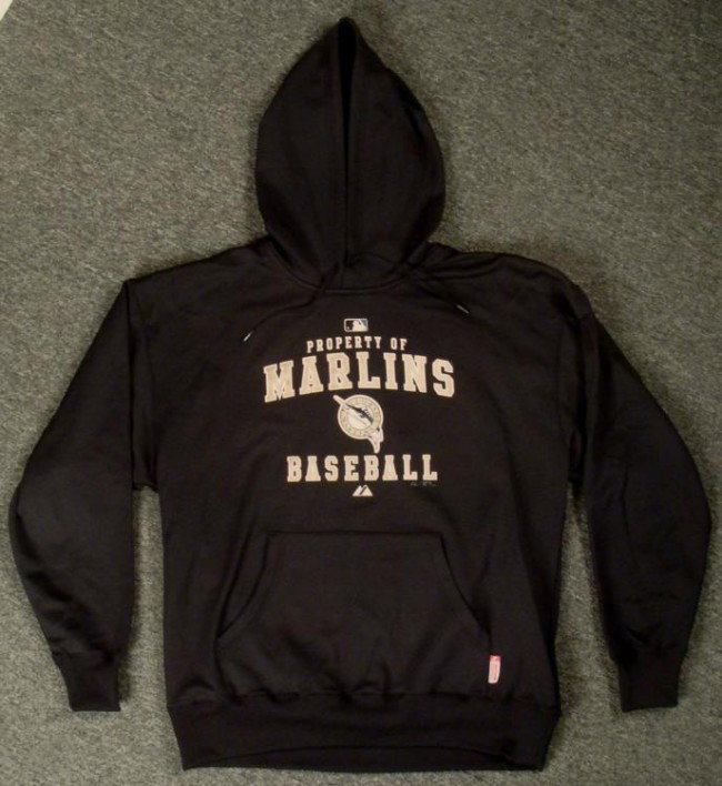 Florida Marlins Authentic Dugout Hoodie and Hat MLB: Offered here is an authentic Florida Marlins hoodie (as seen worn in the dugout) and a hat. The hoodie is all black with cooper writing. The hoodie reads: Property of the Florida Marl