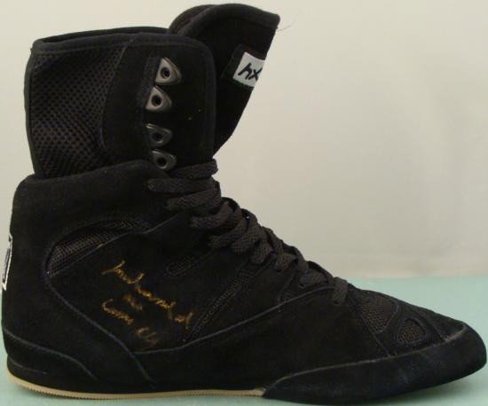 Muhammad Ali Cassius Clay Signed Black Boxing Shoe COA: "The Greatest" himself signed this boxing shoe with both his given name and his name he became famous for. The autographs "Muhammad Ali" and "Cassius Clay" both appear in
