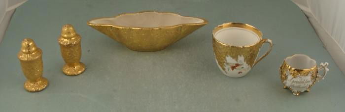 5 Vintage Gold Painted Porcelain Weeping Bright, Mugs: Here are five vintage porcelain pieces, all with gold painted details. One is a Weeping Bright Gold dish, with diamond scalloped shape, 10" wide. There is a mug with gold painted textured pattern, and