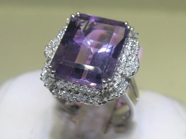 Michael Christoff Amethyst Diamond 14K WG Ring Sz 6 1/2: Amethyst and Diamonds ring * Total Weight of Baguette and Round Diamonds - 0.80 ct * 1 Center Amethyst - 13.00 ct * 14K White Gold - 6.15 grams * Ring Size: 6-1/2 * signed Michael Christoff * *