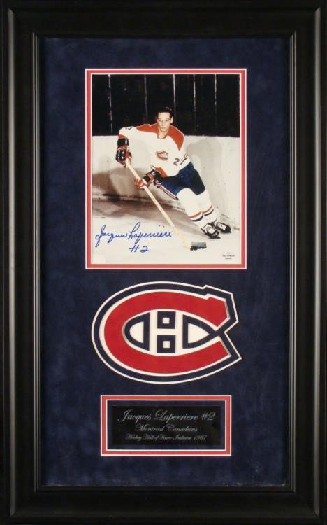 Jacques Laperriere Signed Canadienes HOF Photo Framed: This custom framed photo of Jacques Laperriere was signed by the Canadienes defensive player himself. The photo is 8 x 10, and signed in blue Sharpie, along with his #2. The red and blue double mattin