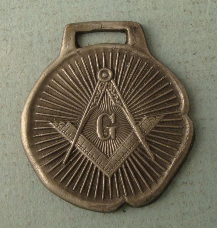 OLD MASONIC FRATERNAL WATCH FOB: THIS IS AN OLD MASONIC FRATERNAL WATCH FOB THAT HAS A 1 1/4" DIAMETER. *