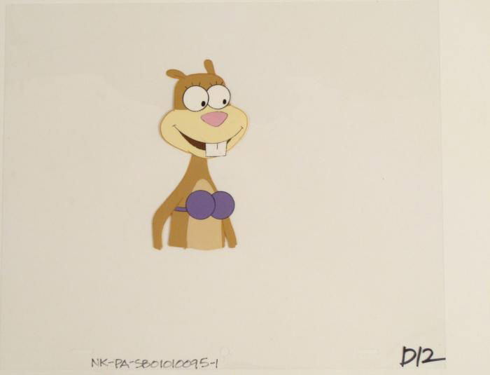 Joyful Sandy Original Production Cel SpongeBob Art Mood: This original animation cel is from the Nickelodeon TV show SpongeBob Squarepants. The story takes place under the deep blue sea in Bikini Bottom, where SpongeBob resides. Sp