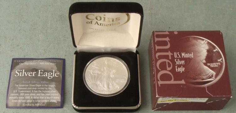 2001 American Silver Eagle Dollar $1 Gem UNC w/Box, COA: 2001 American Eagle Silver Dollar * Condition: Gem Uncirculated Content: .999 troy oz. Fine Silver Diameter: 40.60 mm Includes: Plastic coin holder, hinged velvet box with eagle emblem, and Certificat