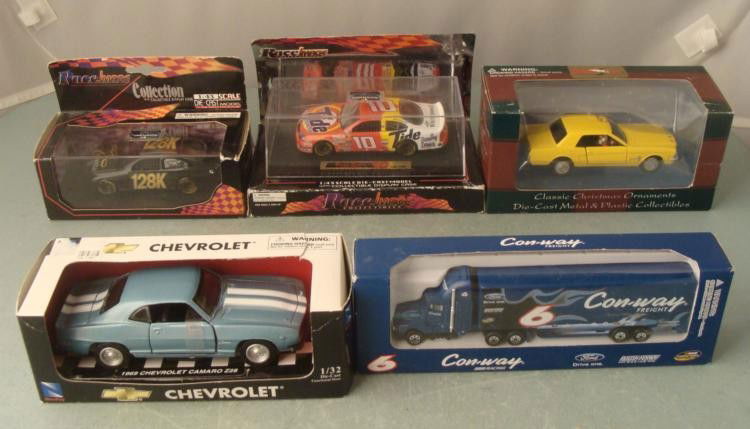 LOT 5 Car Truck Die Cast Maisto Race Nascar Chevy: LOT 5 Car Truck Die Cast Maisto Race Nascar Chevy * All of the items are in their original boxes (1) 1969 Chevrolet Camaro Z28 1:32 scale Die-Cast Made by NewRay (1) Ricky Rudd #10 car Ford Tauru