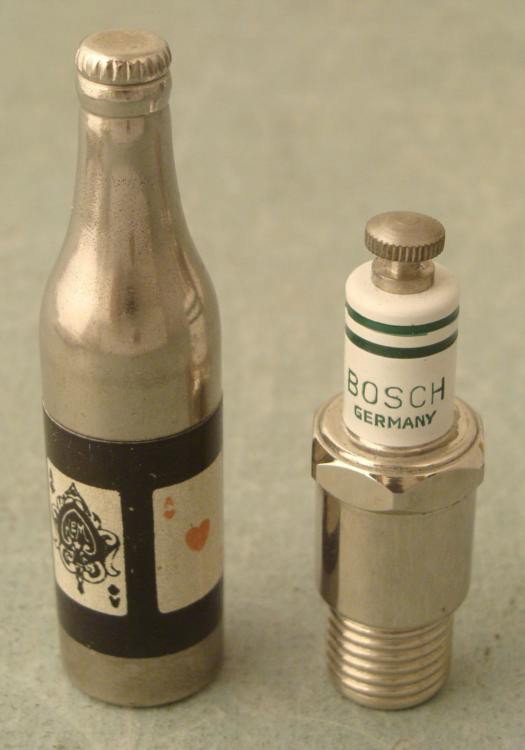 2 Early Mini Lighters -Bosch Spark Plug, Cards-Like New: 2 Early Mini Lighters * Bosch Spark Plug, 2" * Bottle with cards, 2 3/4" * Composition: Both metal Condition: Never Used