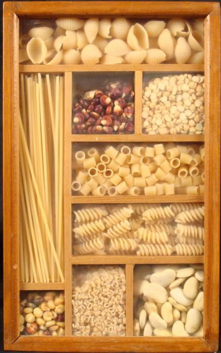 Curio Cabinet Sealed Shadow Box Display w/ Grains, Past: This is a classic vintage shadow box wall display in natural wood with glass front. It is full of grains and pasta, with sprigs of wheat. The case is 7" x 11 1/2". Its condition is very good, with som