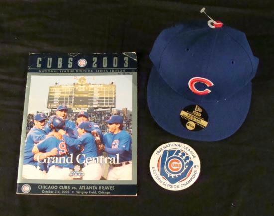 Chicago Cubs MLB 2003 NLDS Program 5950 New Era Hat: Here's something all Cubs fans would want. Offered here is a lot of a fitted New Era Chicago Cubs hat, a pin, and a program. First is a New Era Chicago Cubs hat. The hat is all