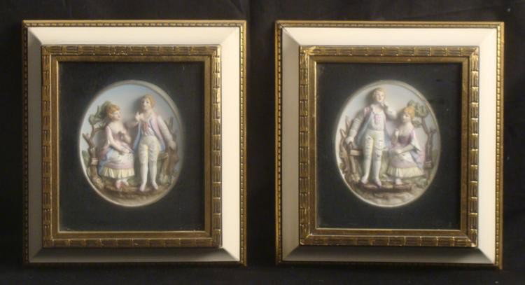 2 Hand Painted Porcelain Relief Romantic Scenes Framed: These two hand painted porcelain relief images portray some romantic scenes. Each is the same, only a mirror image of the other. A young 19th century couple is together on a cobblestone path by a coun
