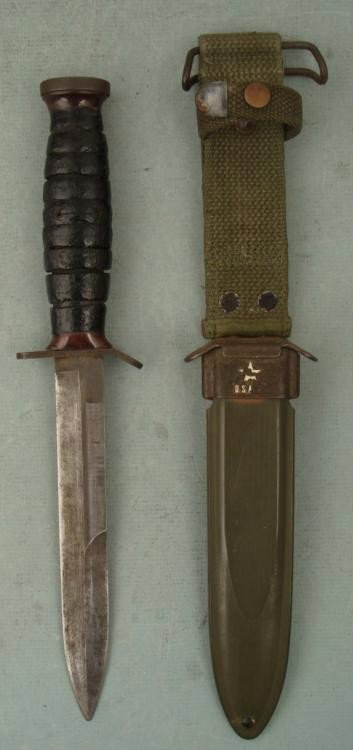 WWII US Imperial Knife Military USM3 In Scabbard: US Imperial Knife Military USM3 In Scabbard United States * Condition: Very Good Cross guard marked USM3 IMPERIAL Painted Leather grip Scabbard: Metal marked USM8, with canvas strap Size of 