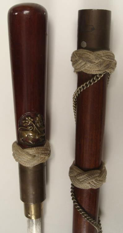 SUPURB WWI ERA BRITISH NAVAL CANE SWORD-METAL INSET: SUPURB WWI ERA BRITISH NAVAL CANE SWORD-METAL LION KING INSET-NAVY KNOTS & CHAIN * ONE OF A KIND QUALITY WWI BRITISH ROYAL NAVY OFFICER'S CANE SWORD--32" IN LENGTH-CRAFTED FROM QUALITY HARDWOOD WI