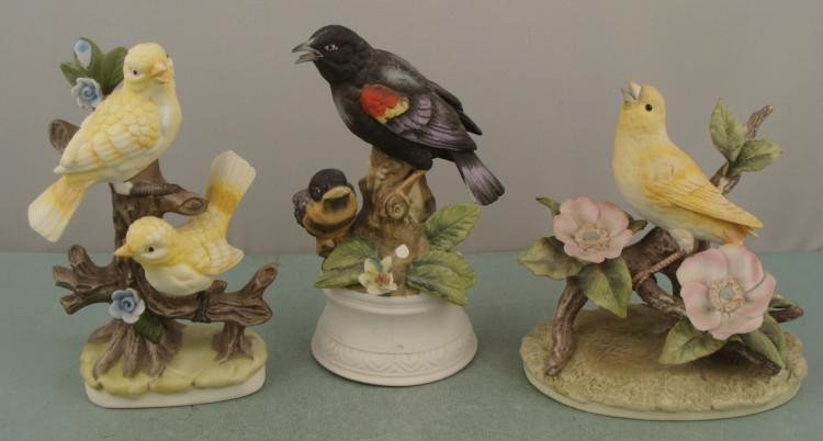 3 Figurines Yellow & Black Birds On Branches Andrea: These 3 ceramic figurines portray some friendly birds sharing branches, including yellow birds, Red Winged Blackbird and a Sparrow. * * Condition: Excellent Single yellow bird: 6" tall * Two yel