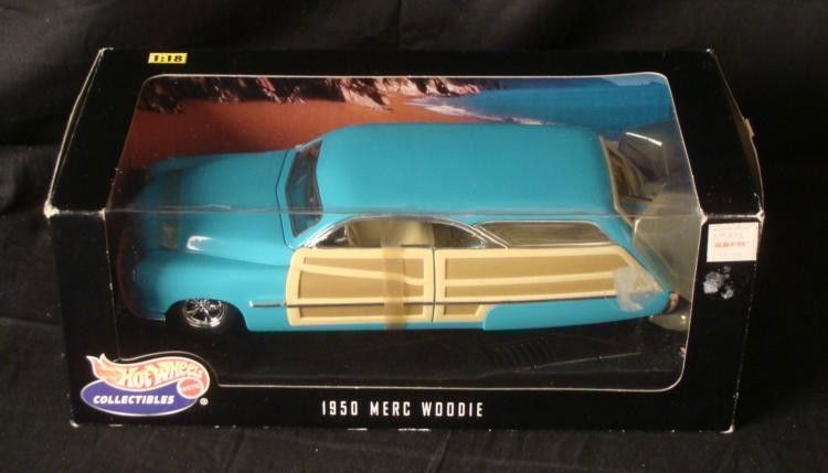Hot Wheels Collectables 1950 Merc Woodie 1:18 Scale car: Hot Wheels Collectables 1950 Merc Woodie 1:18 scale car * There is some creases on the box The car is in its original box 1950 Merc Woodie * Nothing screams "American classic" like a Woodie - and our