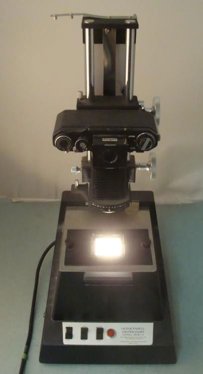 Honeywell Repronar Model 805A Slide Camera: This Honeywell Repronar Model 805A is a camera for photographing slides. The light works, and the camera has not been tested, but it appears to be very good overall, and clean with intact bellows. It