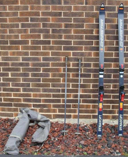 Dynasoft Dynastar Downhill Skis, Rossignol Poles-France: Here is a pair of complete skis and poles, in used but very good condition. The skis are Dynasoft Dynastar Omega. They are Fibrometal Polyurethane. Their length is approximately 72 inches long. Fittin
