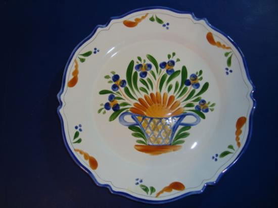 French hand painted plate signed by artist Renoleau:  A very nice French faience earthenware plate made by the artist Roullet Renoleau (4th generation of artist). He studied at the famous Faience School in Limoges (France). This plate was hand-made