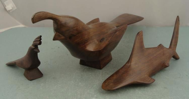 Wood Hand Carvings Shark, Large & Small Birds : These decorative, hand carved figurines portray the smooth flowing forms of a shark, and birds. Condition: Excellent Size of Large Bird: 17" x 4" Size of Small Bird: 6" x 1" Size of Shark: 11" x 3"