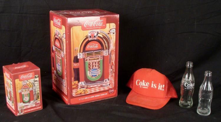 Coca-Cola Jukebox Cookie Jar, Salt & Pepper MIB Bottles: Here are 5 collectible Coca-Cola items. * Coke & a Song jukebox salt & pepper set (mint in the original box)Coke & a Song jukebox cookie jar, 11 1/4" tall, (mint in the original box)Coke i