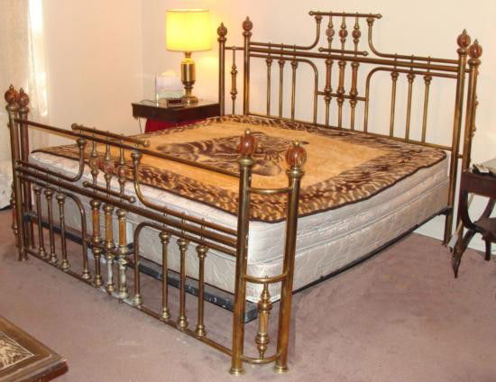 Vintage Brass & Marble Poster Bed King Size Frame: This is a vintage king size brass bed with marble fittings. It is in used but very good condition. * The brass frame has a burnished finish. Portions of the brass surface are darkened from age, so it