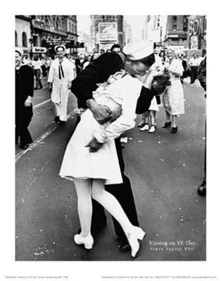 Alfred Eisenstaedt Kissing on VJ Day WWII Poster Print: This is a poster print of the famous photograph showing the joy of the troops returning home. * Artist: Alfred Eisenstaedt Title: Kissing on VJ DayMedium: Print on paper Paper Size: 14 x 11 inches Con