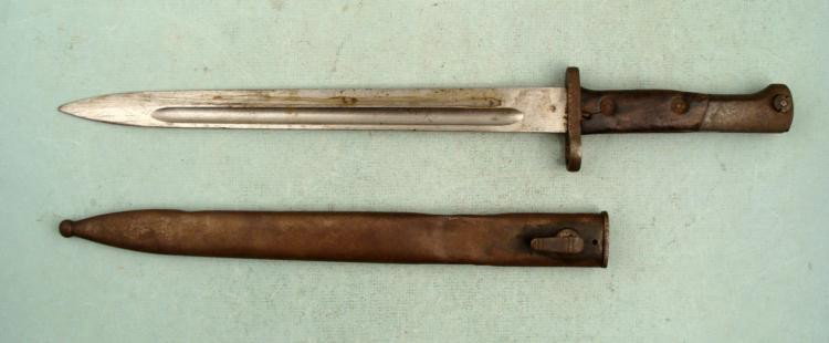 98K WWII TYPE GERMAN MAUSER BAYONET & SCABBARD: THIS IS A WWII ERA 98K TYPE GERMAN MAUSER BAYONET & SCABBARD. IT IS UNMARKED EXCEPT FOR THE SERIAL #08409 ON TOP OF THE POMMEL. IT HAS WOOD GRIPS AND A WORKING RELEASE BUTTON. TH