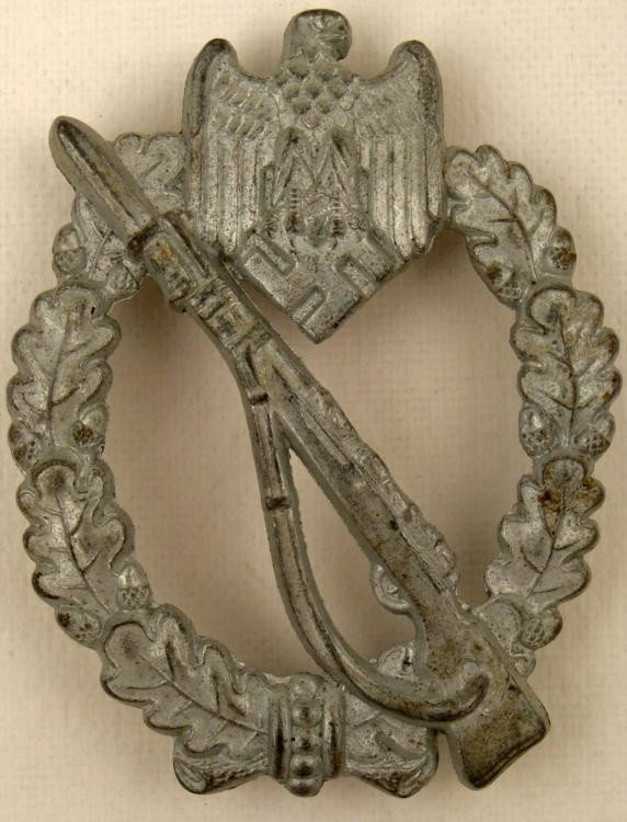 ORIGINAL NAZI INFANTRY ASSAULT BADGE: THIS IS AN ORIGINAL NAZI INFANTRY ASSAULT BADGE WITH AN EAGLE/SWASTIKA AND MAUSER RIFLE. IT IS LACKING A PIN ON THE BACK AND IS MARKED "3" *