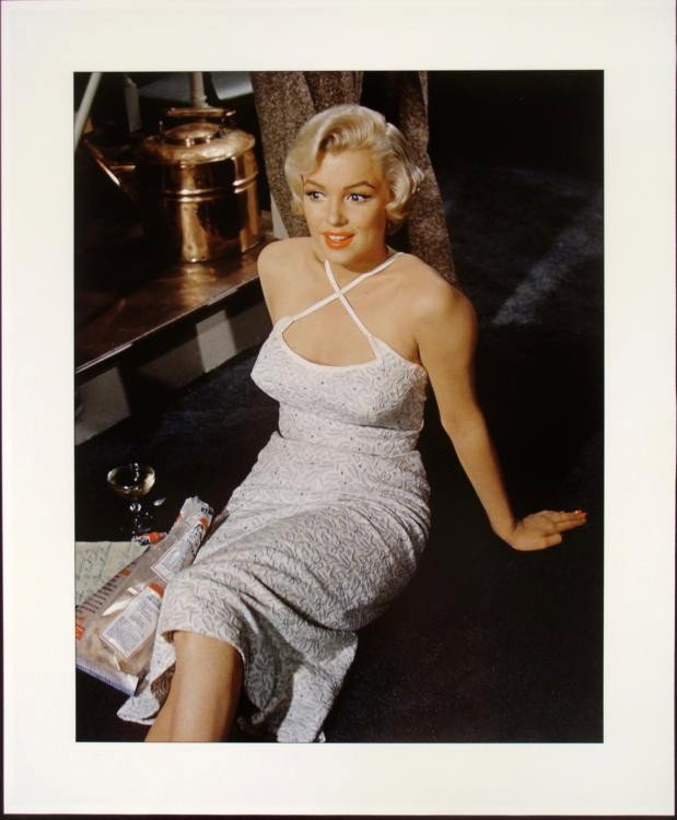 Marilyn Monroe Photo from Orig Negative Seven Year Itch: Here is a seductive Marilyn Monroe with a glass of bubbly and a bag of chips. This photo is from the original negative, taken from the 1955 movie The Seven Year Itch. Medium: Giclee on glossy paper, d