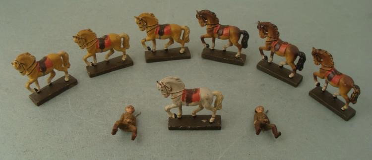 7 GERMAN MADE LINEOL TOY HORSES-AND 2 U.S. SOLDIERS: 7 GERMAN MADE LINEOL COMPOSITE TOY HORSES-AND 2 U.S. DOUGHBOY SOLDIERS * SEVEN LINEOL PRE-WWII GERMAN COMPOSITE TOY HORSES (3" TALL AT HEAD). TWO ARE WITH WWI U.S. DOUGHBOY SOLDIER RIDERS. 