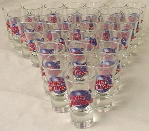 50 Planet Hollywood Shot Glasses Dealer Mystery Bag: This is a super lot of 50 shot glasses from the original Planet Hollywood restaurants! * What you will receive is a mystery box--that is, an unknown assortment from various Planet Hollywood locations.