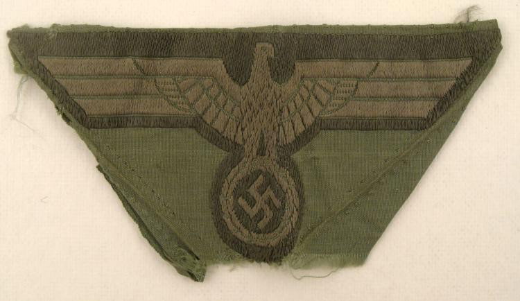 ORIGINAL M-43 CAP EAGLE AND SWASTIKA TRAPEZOID MINT: THIS IS AN ORIGINAL M-43 CAP WITH AN EAGLE AND SWASTIKA. THE CLOTH OF THE CAP IS IN A SHAPE OF A TRAPEZOID AND IS IN NEAR MINT CONDITION. *