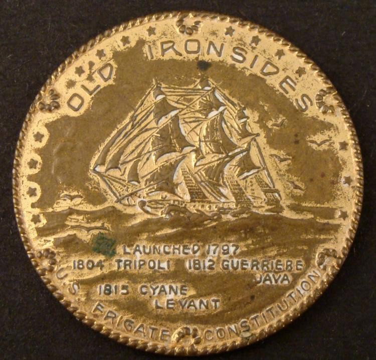 C1900 COIN MEDALLION 25 CENT TO OLD IRONSIDES FUND: OFFERED HERE IS A C1900 COIN MEDALLION-25 CENT CONTRIBUTION TO "OLD IRONSIDES" FUND. * THE COIN SHOWS OLD IRONSIDES ON THE FRONT WITH THE MAKER'S0 MARK "ROBBINS CO". THE DIAMETER IS 1 