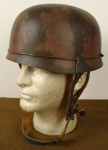 NAZI LUFTWAFFE PARATROOPER HELMET-CAMO & BARBED WIRE: OUTSTANDING NAZI LUFTWAFFE PARATROOPER HELMET-CAMO & BARBED WIRE-FULL MARKED LINER * NAZI LUFTWAFFE PARATROOPER'S CAMOFLAUGE HELMET-IN GREEN AND BROWN BLOTCHIONG-BARBED WIRE CUT AND ATTACHED NEAR