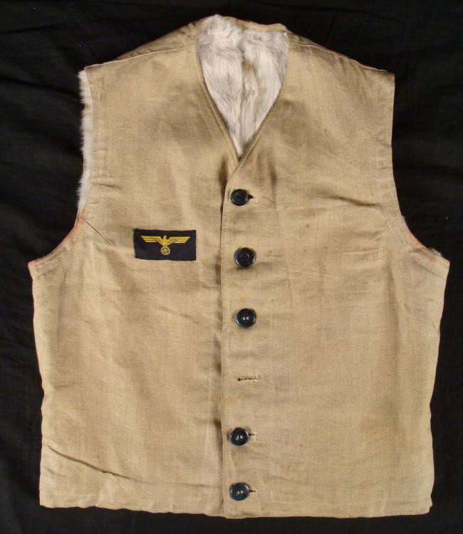 NAZI WINTER WESTERN FRONT ERSATZ VEST-RABBIT FUR LINED: NAZI WINTER WESTERN FRONT ERSATZ VEST-RABBIT FUR LINED-NAZI ARMY INSIGNIA ON FRONT-HERRINGBONE TWILL FABRIC * + NAME "KOSMAS" INKED INTO INSIDE BOTTOM EDGE MATERIAL *