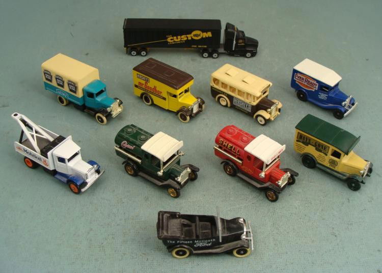 10 Die Cast Cars Lledo and Road Champs Hershey Shell: Here are ten die cast cars. Nine of them are from Lledo (England) and one is from Road Champs. The Lledo trucks are from the "Days Gone" series. In this lot you will receive: * Road
