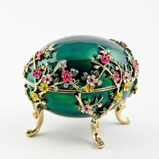Kelch Apple Blossom Faberge Egg: Kelch Apple Blossom Faberge Egg, Dimensions: 3in (H) X 4in (L) x 3in (W), Weight: 1 lb 2 oz, Material: Pewter, Crystals, Enamel. The egg contains a delicate arrangement of distinct