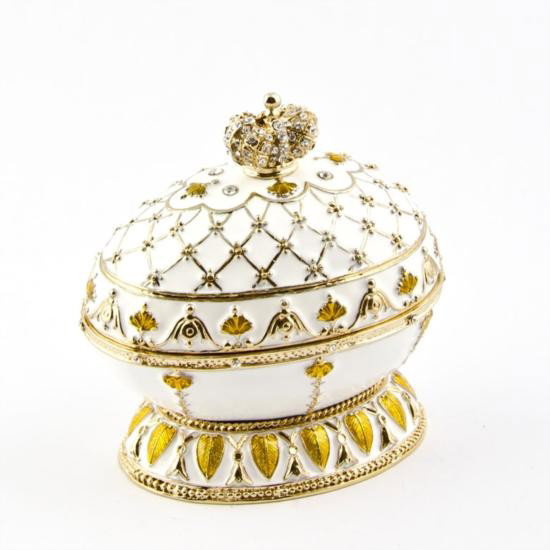 Renaissance Faberge Egg: Renaissance Faberge Egg, Dimensions: 2.5in (H) X 2.75in (L) X 1.75in (W), Weight: 10 oz, Material: Pewter, Enamel. The famed Faberge eggs are jeweled eggs, often with the most orna