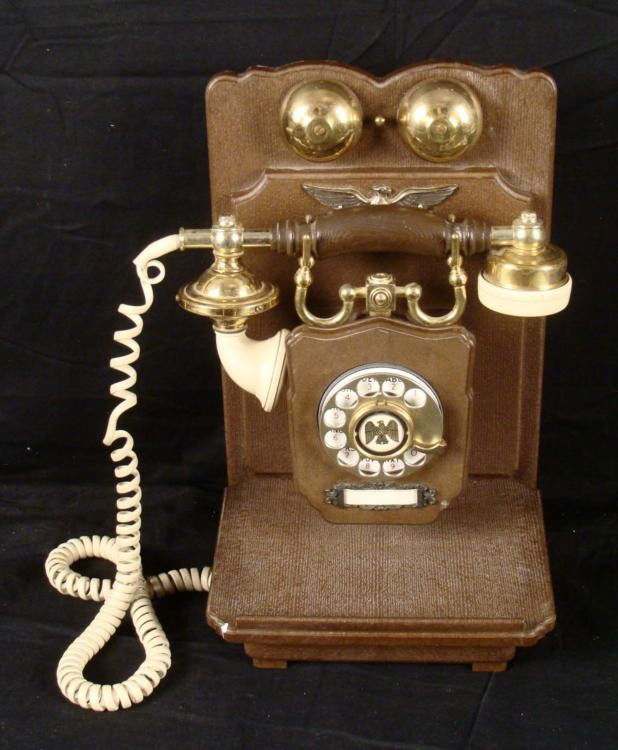 United States Telephone Company Antique Wall Phone: This is a vintage reproduction of an antique wall phone made in Japan by the United States Telephone Company. It has not been tested, but appears to be in very good condition, with full cord and wires