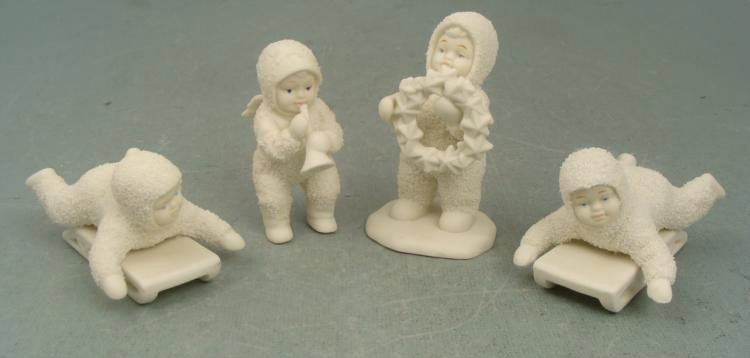 4 Snow Babies Figurines Sledding Wreath Trumpet Wings: These four delightful Snow Babies Figurines are having fun, and being charming in their snowy suits. * Condition: ExcellentAll of the babies have blue eyes4 figuresBaby w/ wings playing trumpetSize: 4