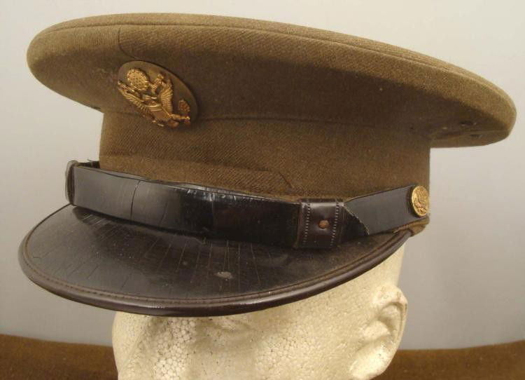 ORIGINAL WWII AAF VISOR CAP: THIS IS AN ORIGINAL WWII AAF VISOR CAP. THE INSIDE SWEAT DIAMOND IS MARKED "BROOKS, CALIF, UNIFORM DEPT". IT IS A SIZE MEDIUM WITH A COUPLE OF MOTH NIPS TO THE TOP WOOL. * * * *