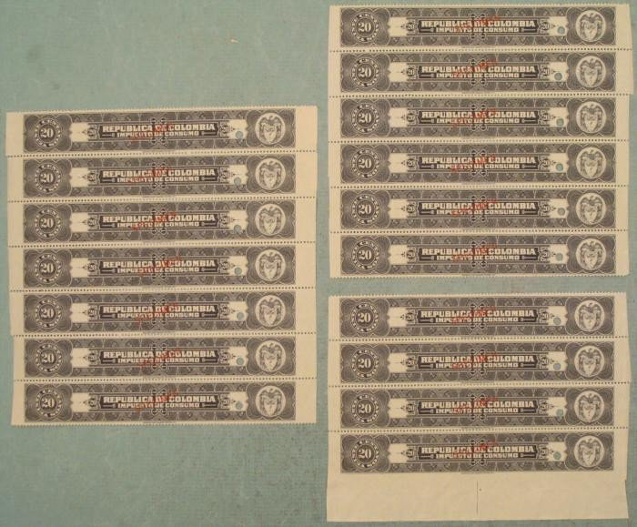 17 Colombia Plate Block Specimen Tax Stamps 20 Centavos: This is a plate block of (17) 20 Centavos tax stamps (in 3 separate sections) from Republic De Colombia, marked "IMPUESTO DE CONSUMO." Each has a red "SPECIMEN" overprint and security punch. They are 