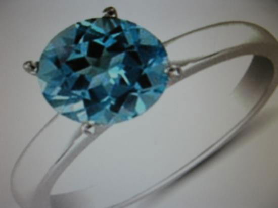 Genuine 2.40 ctw. Round Aqua marine 14 ct. Ring: Beautiful New 2.40 ctw. Aqua Marine Round Brilliant cut 14 ct. White gold ring. size 6 1/2. 2.4 g.Top Quality and Color AAA rated in color and clarity.Stunning Ring. valued at over $1,100.Start Lo