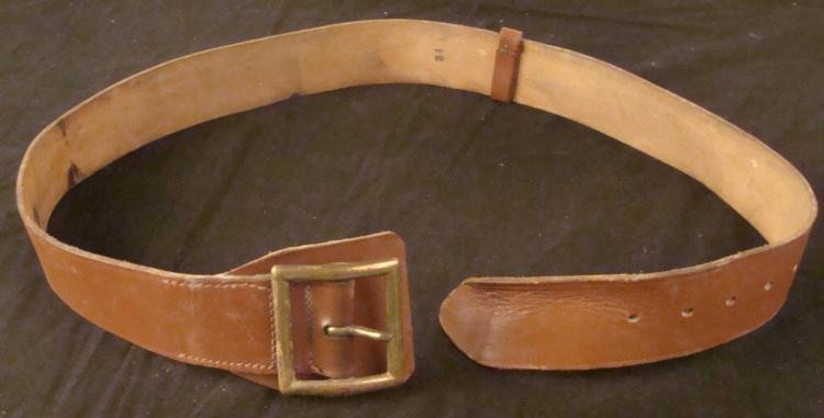 OFFICER'S WWII WIDE LEATHER DRESS BELT W/ BRASS BUCKEL: OFFICER'S WWII WIDE LEATHER DRESS BELT WITH BRASS BUCKEL-ID'D TO AAF OFFICER * GREAT ORIGINAL BELT-STAMPED 34 BUT HAS A MEASURED LENGTH OF 40" END TO END. HIGH QUALITY MEDIUM BROWN LEATHER. OFFICER NA