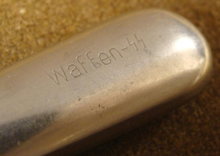WAFFEN-SS ORIGINAL DINING HALL KNIFE: OFFERED HERE IS AN ORIGINAL WAFFEN-SS DINING HALL KNIFE. IT MEASURES OUT TO BE 9 3/4" LONG. ROSTFREI (STAINLESS) IS MARKED ON THE BLADE AND HANDLE. THE WAFFEN-SS IS STAMPED INTO THE 