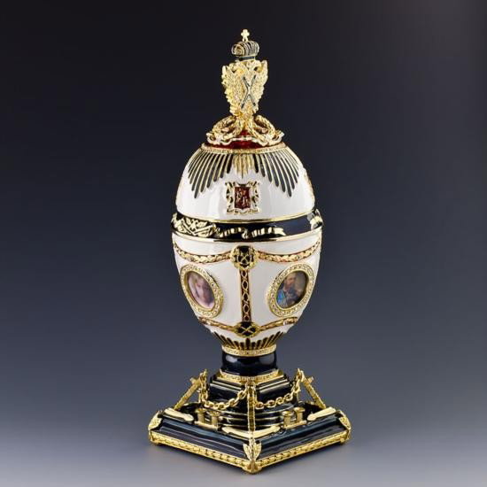 Imperial Eagle Faberge Style Egg: Imperial Eagle Faberge Style Egg, Dimensions: 8.5in (H), Material: Pewter, Enamel, Crystals. The famed Faberge eggs are jeweled eggs, often with the most ornate, minuscule desi