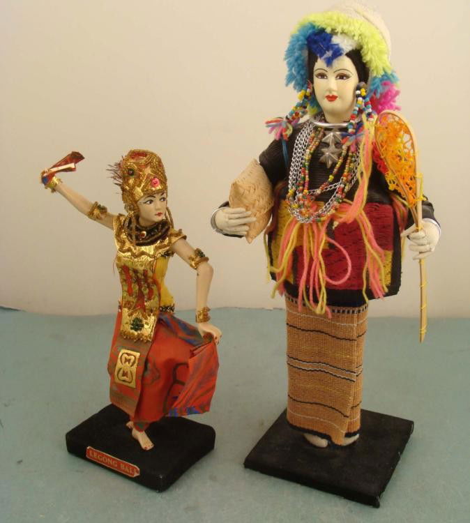 2 Vintage Costume Dolls Thailand, Bali -Hand Made: These two vintage dolls show some of the most colorful costumes of their native countries. One is a woman from Thailand, in a costume not seen very often. She is wearing a bright colors, jewelry, and