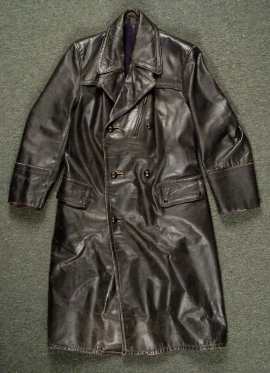 WWII Large Black Leather German Police Overcoat Nazi?: This is a Large Black Leather German Police Overcoat, possibly part of a Nazi police uniform. There are no markings on the coat, and we can't say for sure, so the low opening bid is reflective of this