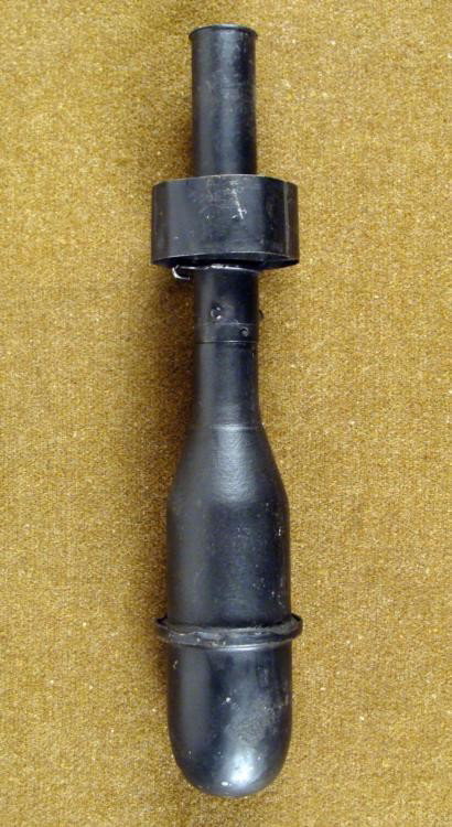 WWII US RIFLE GRENADE-INERT-M1 CARBINE USED M8 LAUNCHER: WWII US RIFLE GRENADE-INERT-M1 CARBINE USED THE M8 GRENADE LAUNCHER * 11" IN LENGTH-UNSCREWS TOWARD CENTER-BLACK PAINT *