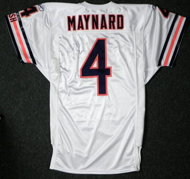 Brad Maynard Signed Bears Game Jersey "Go Bears!": Punter Brad Maynard signed this authentic game jersey, along with his number, and an inspiring cheer "Go Bears!" The autograph is in black Sharpie. The jersey is a genuine NFL Reebok On Field, size 42